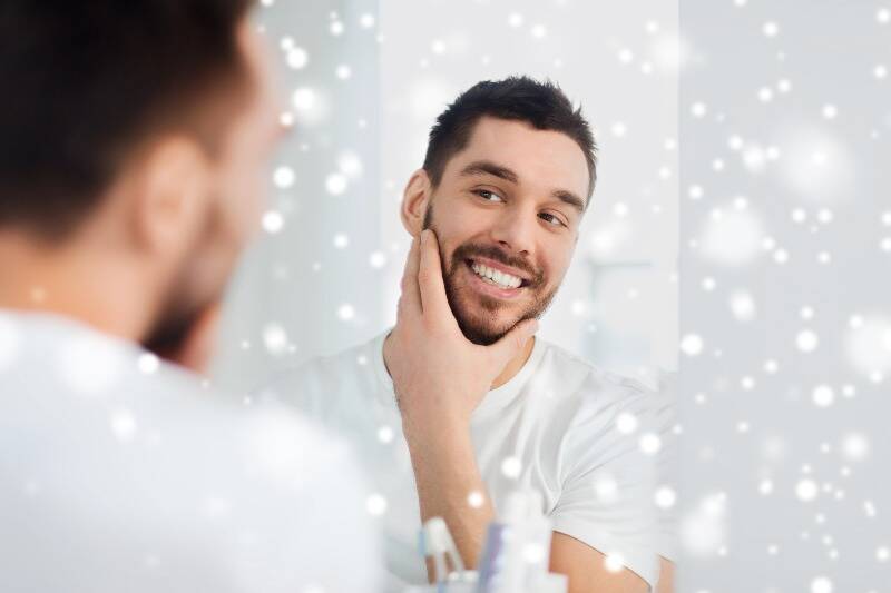 Man checking his smile